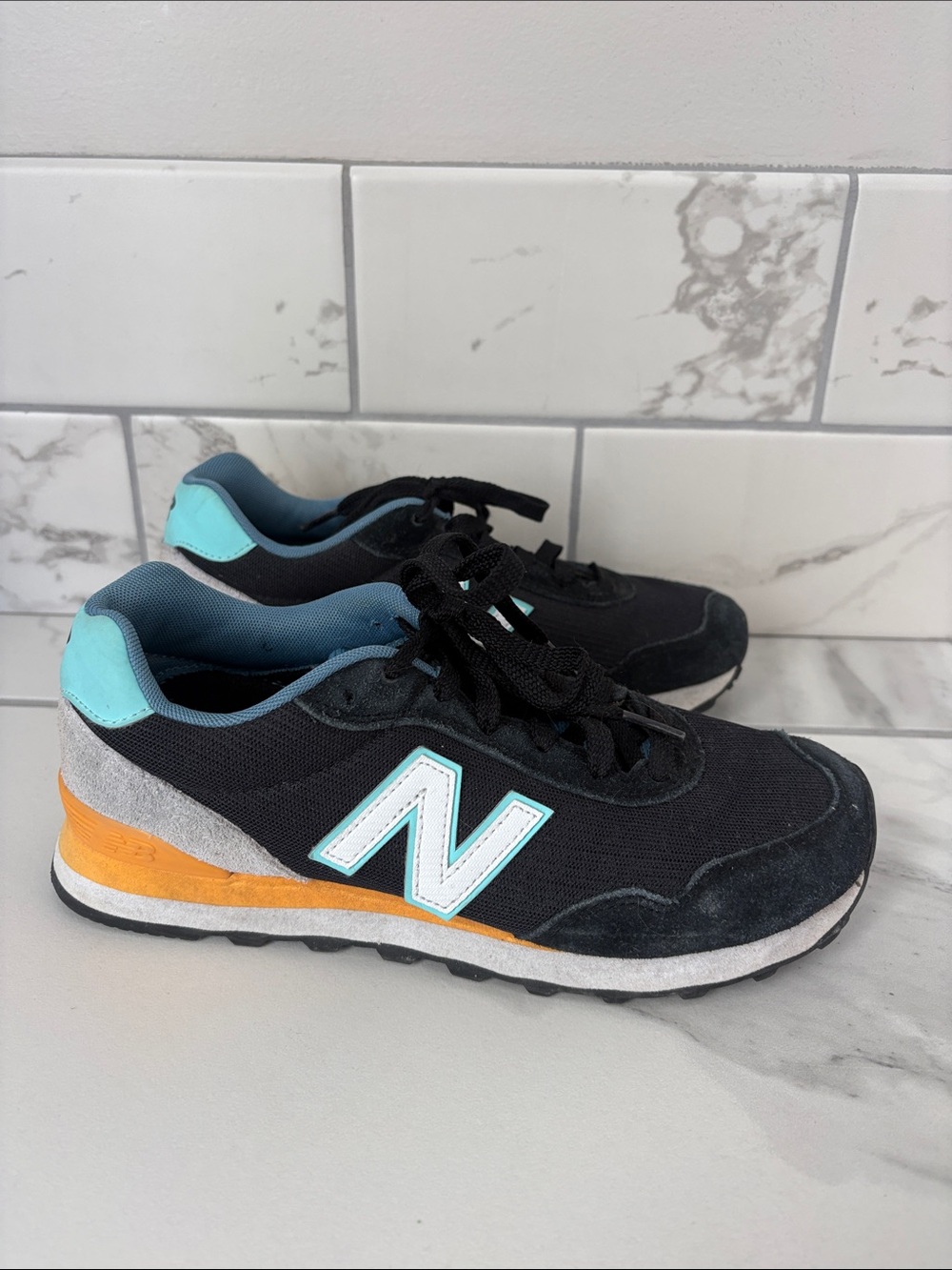 New Balance Women's 515 V3 Sneaker Black/Surf Size 7.5